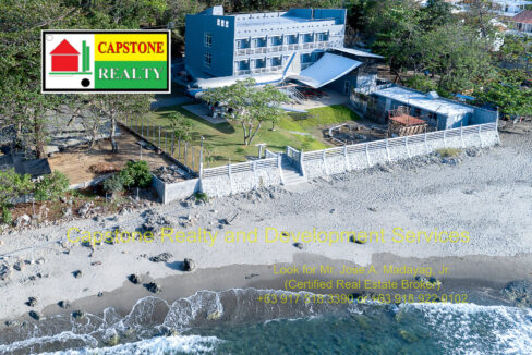 aerial drone shot of hostel pre construction of 2nd bldg